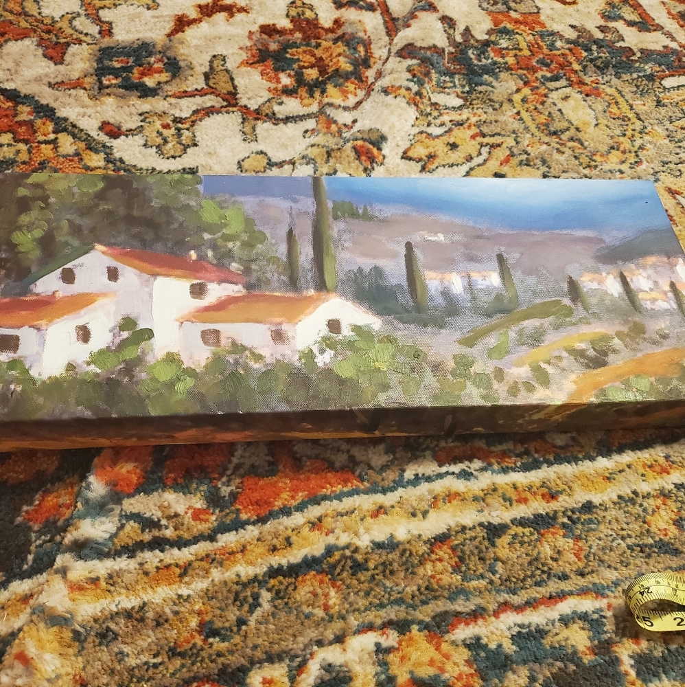Red roof building canvas picture.